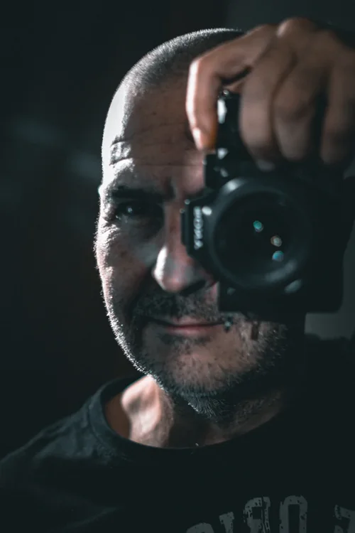 Photographer holding a Sony camera